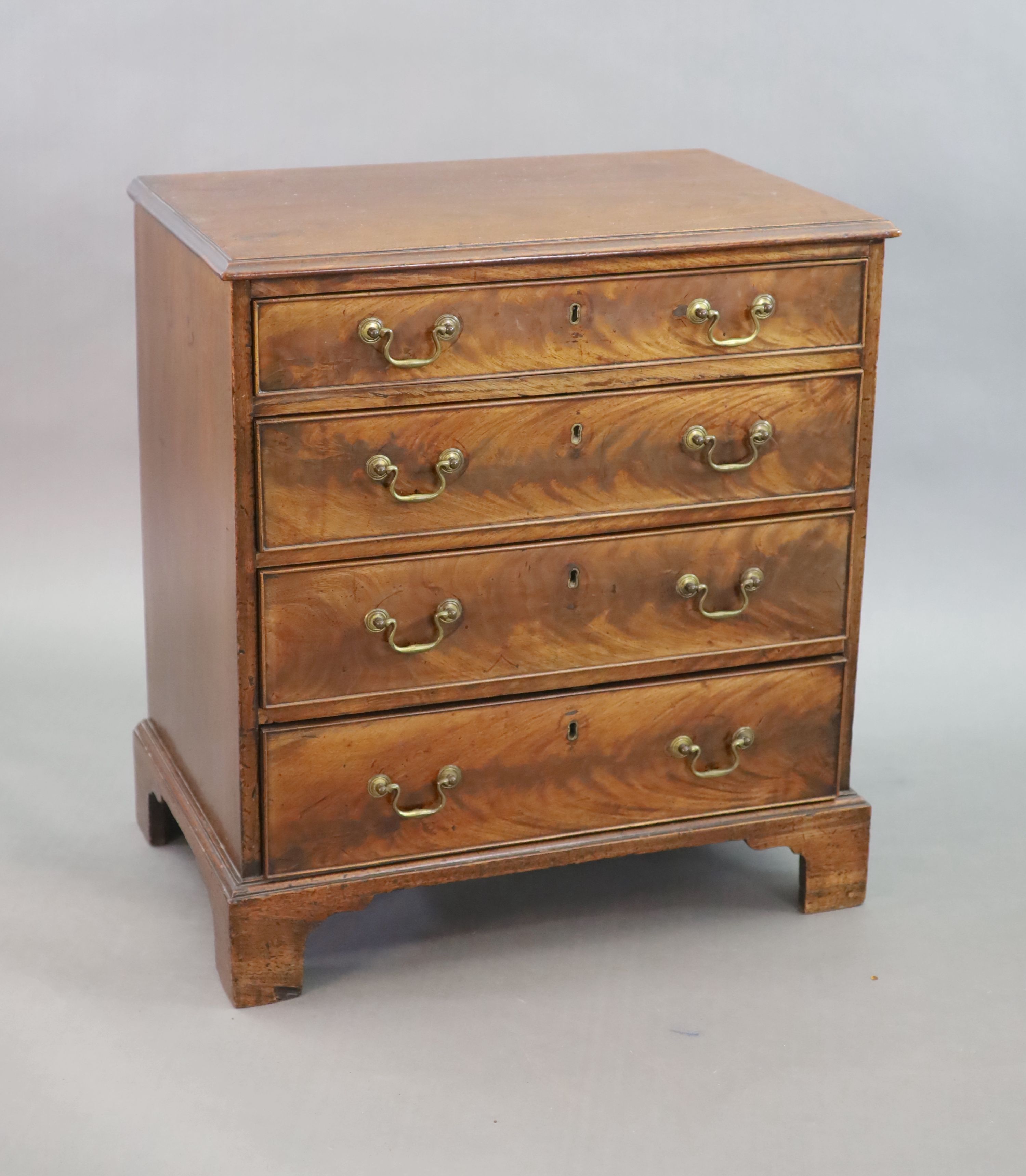 An unusually small George III mahogany chest of drawers, W.68cm D.45cm H.74cm